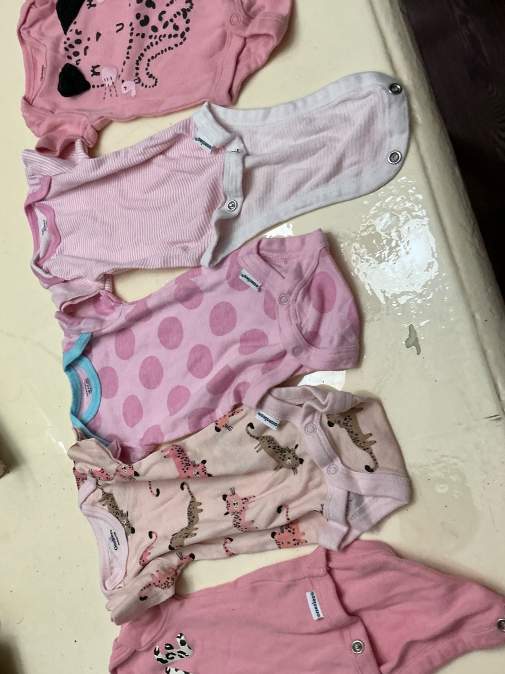 Gerber Pink Baby One-Piece Bodysuit - Pack of 5 . Size NB fits 5 to 8 pounds